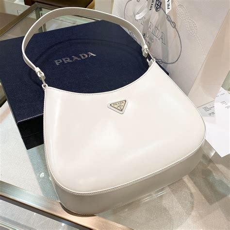 prada cleo bag white.